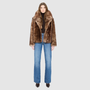 The TOSKA Jacket is a versatile statement piece crafted in burma nappa and toscana shearling. This reversible oversized cropped teddy allows you to switch between a plush teddy texture and a sleek nappa finish for two distinct looks. Designed with a drop-shoulder silhouette and relaxed fit through the shoulders, arms, and body, it combines comfort with elevated style. The oversized Toscana notch collar and functional side pockets complete this luxurious, cold-weather essential.