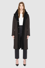 The ZIRA Coat is a heritage-inspired vintage reversible shearling jacket crafted in java nappa and iron wool. Designed to flip effortlessly from sleek nappa to plush iron wool teddy, it delivers versatile styling for both après-ski sophistication and everyday cold-weather elegance. Featuring a relaxed dropped shoulder, notch collar, and 3-button closure, ZIRA combines modern tailoring with timeless texture. Practical zip pockets on the nappa side and patch pockets on the teddy side