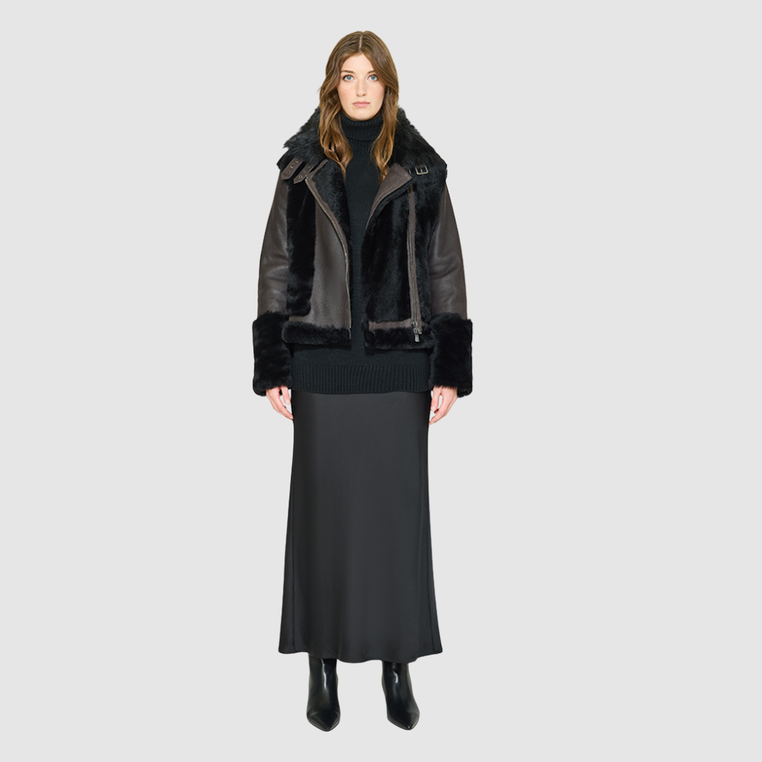 The SOUL Jacket is a heritage-inspired shearling moto crafted in nappa&nbsp;and toscana rasado wool for a bold, modern edge. Its soft wool on a sleek nappa body, regular&nbsp;shoulder, and sheared wool sleeves create a striking contrast of texture and silhouette. The Toscana long wool collar with double buckle detail, asymmetrical front zip closure, and functional side and interior zip pockets make SOUL both stylish and practical. Perfect for après-ski layering or elevated citywear