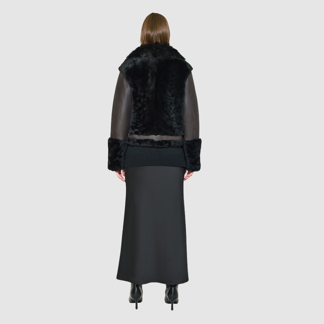 The SOUL Jacket is a heritage-inspired shearling moto crafted in nappa&nbsp;and toscana rasado wool for a bold, modern edge. Its soft wool on a sleek nappa body, regular&nbsp;shoulder, and sheared wool sleeves create a striking contrast of texture and silhouette. The Toscana long wool collar with double buckle detail, asymmetrical front zip closure, and functional side and interior zip pockets make SOUL both stylish and practical. Perfect for après-ski layering or elevated citywear