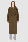 The HARPER Coat is a luxury oversized wool coat crafted from a premium Italian wool-cashmere blend in a rich  tone. Designed with a double-breasted front, drop shoulders, and an oversized fit through the shoulders, arms, and torso, it delivers both comfort and modern edge. A large notch collar and back vent add tailored refinement, while single welt pockets provide everyday functionality. HARPER is the ultimate women’s statement wool coat that blends timeless tailoring with contemporary proportions.
