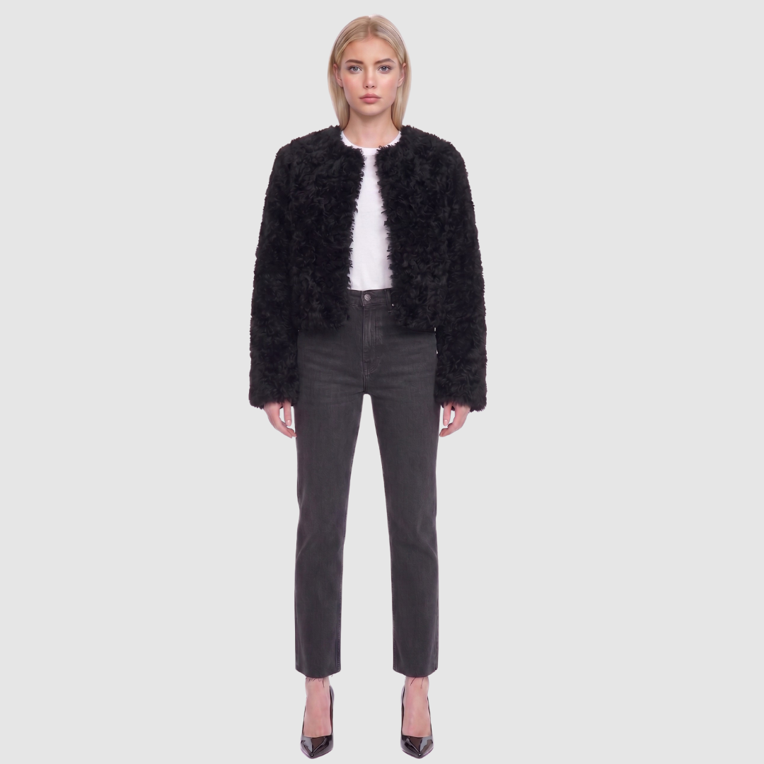 The HiSO SORA Jacket is a heritage-inspired cropped shearling jacket, masterfully crafted from premium curly wool shearling for rich texture and dimension. Its regular shoulder and tailored cropped silhouette create a sleek, contemporary fit, while the collarless design and clean edges offer a minimalist, modern aesthetic. Fully lined for exceptional comfort and designed with a hidden hook closure for a seamless finish, the jacket features standard straight sleeves and functional slash side pockets