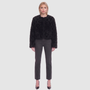 The HiSO SORA Jacket is a heritage-inspired cropped shearling jacket, masterfully crafted from premium curly wool shearling for rich texture and dimension. Its regular shoulder and tailored cropped silhouette create a sleek, contemporary fit, while the collarless design and clean edges offer a minimalist, modern aesthetic. Fully lined for exceptional comfort and designed with a hidden hook closure for a seamless finish, the jacket features standard straight sleeves and functional slash side pockets
