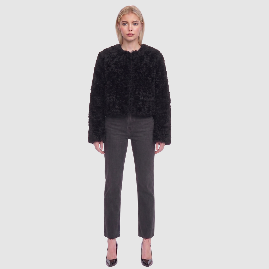 The HiSO SORA Jacket is a heritage-inspired cropped shearling jacket, masterfully crafted from premium curly wool shearling for rich texture and dimension. Its regular shoulder and tailored cropped silhouette create a sleek, contemporary fit, while the collarless design and clean edges offer a minimalist, modern aesthetic. Fully lined for exceptional comfort and designed with a hidden hook closure for a seamless finish, the jacket features standard straight sleeves and functional slash side pockets