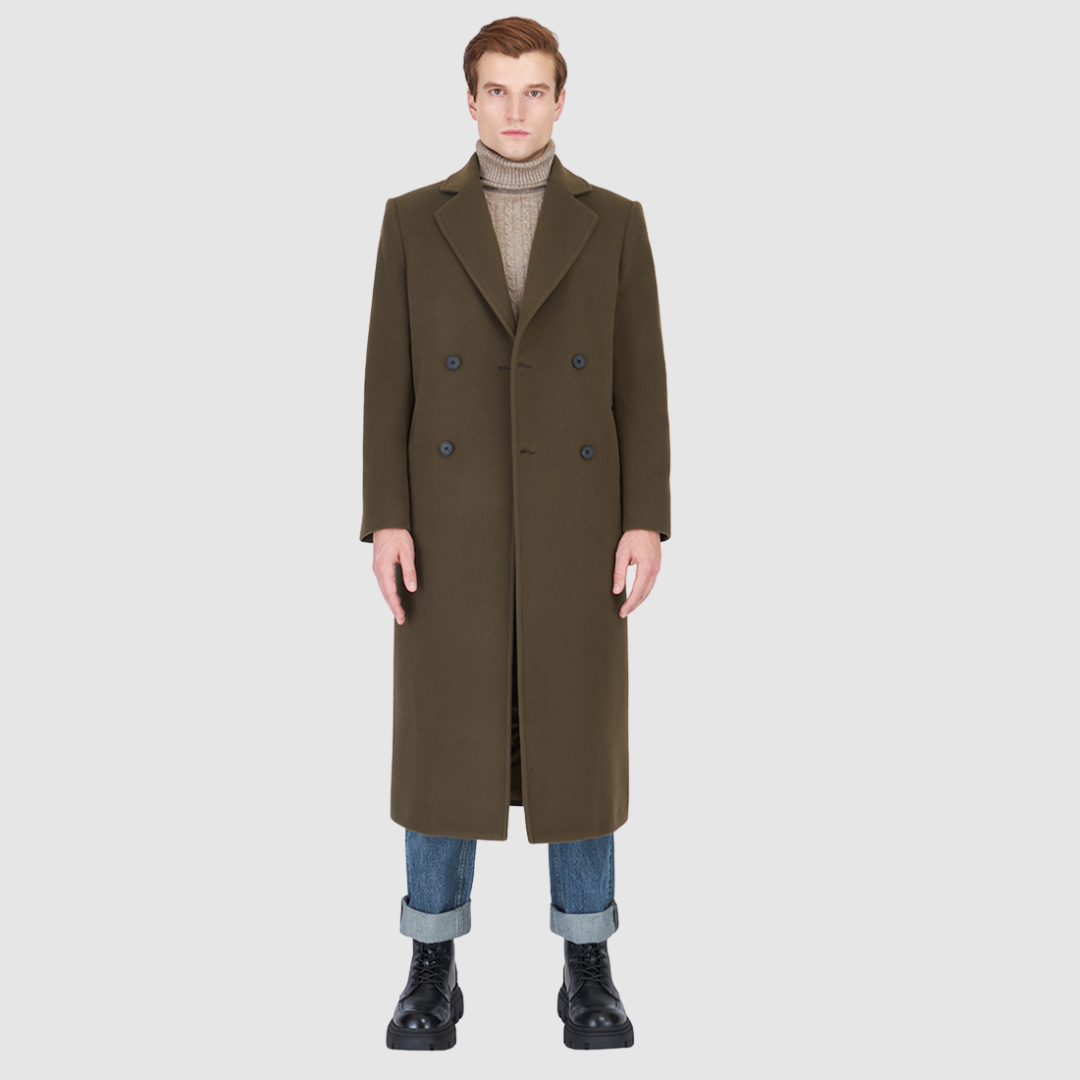Stylish man wearing an Atlas Olive Wool Coat with a turtleneck, showcasing luxury coats for warm winter layers.