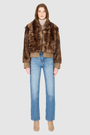 The BEAN Bomber Jacket is a modern cropped silhouette crafted in luxurious toscana wool. Designed with oversized shoulders for a relaxed fit, it delivers effortless volume and style. A stand collar and hook closure give it a clean, minimalist finish, while slash side pockets add everyday functionality. Fully lined for comfort, BEAN is the ultimate statement bomber for cold-weather layering.