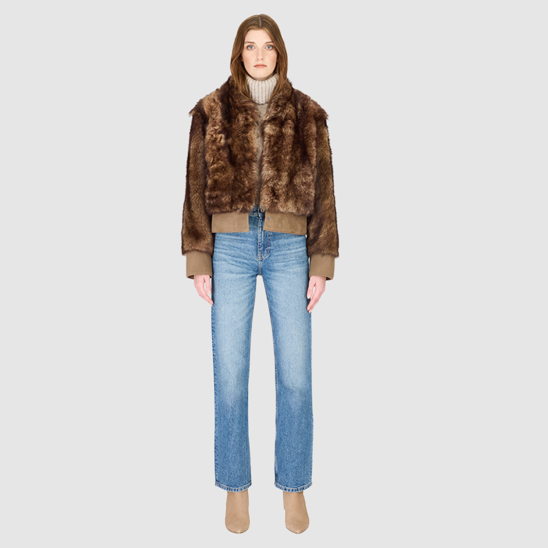 The BEAN Bomber Jacket is a modern cropped silhouette crafted in luxurious toscana wool. Designed with oversized shoulders for a relaxed fit, it delivers effortless volume and style. A stand collar and hook closure give it a clean, minimalist finish, while slash side pockets add everyday functionality. Fully lined for comfort, BEAN is the ultimate statement bomber for cold-weather layering.