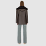The CHEREZ Jacket is a modern mid-length hooded silhouette crafted in chocolate nappa leather shearling. Designed with drop shoulders, it offers dual-fit versatility with a tailored regular fit on the nappa side and a relaxed fit when reversed to the plush wool-out side. An exaggerated convertible hood drapes effortlessly across the shoulders as a shawl-like collar when unbuttoned, while a single-breasted button closure delivers a clean, minimalist finish. 