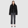 The HiSO CUPID Jacket is a heritage-inspired mid-length shearling jacket, masterfully crafted from premium semi-curly shearling wool for rich texture and dimension. Its regular shoulder and relaxed mid-length silhouette create a sleek, contemporary fit, while the dramatic, oversized stand collar offers an elevated, modern aesthetic. Designed with a versatile, reversible layout, this statement piece offers two distinctive looks in one