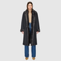 Reversible suede loose fitting coat Reverses to iron wool teddy Slight drop shoulder Double breasted button closure