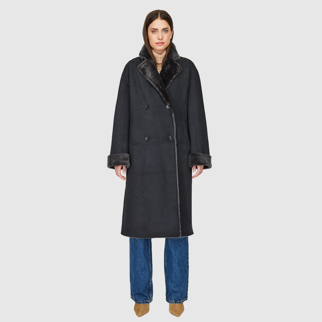 Reversible suede loose fitting coat Reverses to iron wool teddy Slight drop shoulder Double breasted button closure