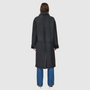 Reversible suede loose fitting coat Reverses to iron wool teddy Slight drop shoulder Double breasted button closure