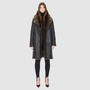 The JOY Jacket is a heritage-inspired reversible outerwear piece crafted in carbon suede shearling. Designed to flip seamlessly from plush oversized teddy to sleek suede, it offers versatile styling for both après-ski sophistication and everyday winter elegance. With a drop shoulder, large notch collar, and oversized silhouette, JOY combines comfort with modern edge. Functional slash side pockets on the teddy side and single welt pockets on the suede side, along with a front button closure, complete this lu