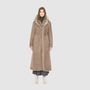 The MAEVE Coat is a heritage-inspired reversible outerwear piece crafted in Taupe Brisa semi-suede and Toscana rasado teddy. Designed to flip seamlessly from plush wool-out to sleek suede skin-out, it offers versatile styling for both everyday wear and après-ski sophistication. A drop shoulder provides ease of movement, while the fit adapts—regular when worn wool-out and semi-fitted when worn skin-out. 