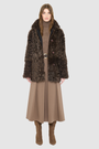 The HiSO MILKY WAY Jacket is a heritage-inspired mid-length shearling coat, masterfully crafted from premium Toscana shearling for unparalleled texture and depth. Its regular shoulder and relaxed mid-length silhouette create an elegant, contemporary fit, while the spread collar frames the face with plush, long-haired wool. Designed with a versatile, reversible construction, this statement coat provides two distinctive looks in one
