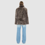 The HiSO MILKY WAY Jacket is a heritage-inspired mid-length shearling coat, masterfully crafted from premium Toscana shearling for unparalleled texture and depth. Its regular shoulder and relaxed mid-length silhouette create an elegant, contemporary fit, while the spread collar frames the face with plush, long-haired wool. Designed with a versatile, reversible construction, this statement coat provides two distinctive looks in one
