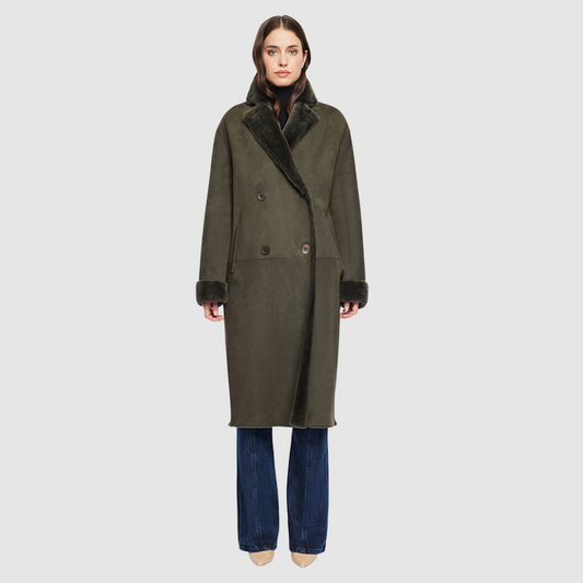 The ELLE Coat is a heritage-inspired oversized reversible shearling piece crafted in khaki suede and ironed wool teddy. Designed to transition seamlessly from smooth suede to plush wool-out texture
