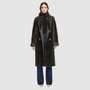 The ELLE Coat is a heritage-inspired oversized reversible shearling piece crafted in khaki suede and ironed wool teddy. Designed to transition seamlessly from smooth suede to plush wool-out texture
