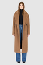 The HARPER Coat is a luxury oversized wool coat crafted from a premium Italian wool-cashmere blend in a rich came tone. Designed with a double-breasted front, drop shoulders, and an oversized fit through the shoulders, arms, and torso, it delivers both comfort and modern edge. A large notch collar and back vent add tailored refinement, while single welt pockets provide everyday functionality. HARPER is the ultimate women’s statement wool coat that blends timeless tailoring with contemporary proportions.