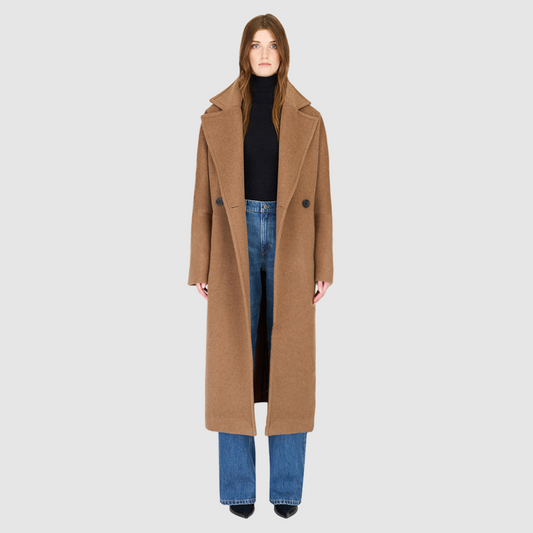 The HARPER Coat is a luxury oversized wool coat crafted from a premium Italian wool-cashmere blend in a rich came tone. Designed with a double-breasted front, drop shoulders, and an oversized fit through the shoulders, arms, and torso, it delivers both comfort and modern edge. A large notch collar and back vent add tailored refinement, while single welt pockets provide everyday functionality. HARPER is the ultimate women’s statement wool coat that blends timeless tailoring with contemporary proportions.