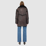 The LUREEN Coat is a luxury reversible semi-suede outerwear piece crafted in Java Toscana. Designed to flip seamlessly from smooth semi-suede to plush Toscana wool teddy, it offers versatile styling for cold-weather layering. The wool-out Toscana seam detailing on the semi-suede side, combined with a drop shoulder and relaxed fit through shoulders, arms, and torso, creates effortless volume and structure. An oversized Toscana notch collar, patch pockets on both sides, and a front button closure.