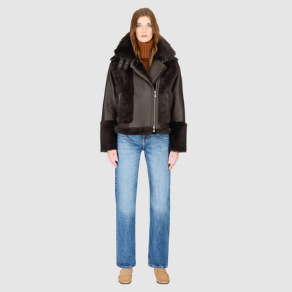 Soft wool on sleek nappa moto Drop shoulder Wool out cuff detail & sheared wool body and sleeves Toscana long wool collar with double buckle detail Asymmetrical front zip closure Side and interior zip pockets