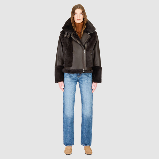 Soft wool on sleek nappa moto Drop shoulder Wool out cuff detail & sheared wool body and sleeves Toscana long wool collar with double buckle detail Asymmetrical front zip closure Side and interior zip pockets