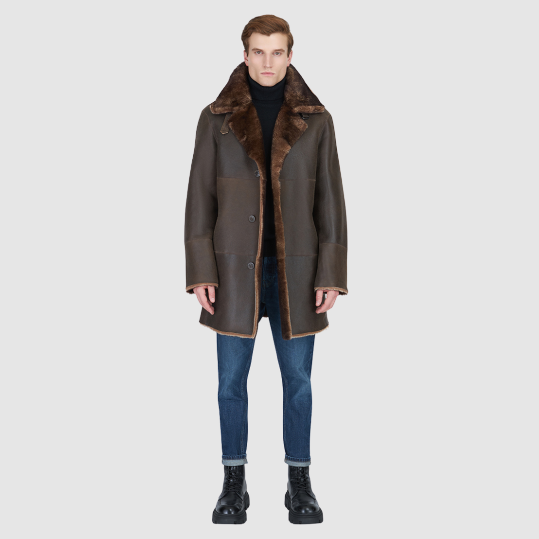 The Edson Burma Reversible Shearling Jacket is a mid-length men’s coat engineered for winter warmth and versatile styling. Crafted from luxe nappa with a plush ironed wool teddy reverse, it delivers two distinct silhouettes: structured and tailored when nappa-out, or relaxed and oversized when wool-out. Designed with a spread collar, raw edge detailing, and functional dual pockets, this jacket provides effortless layering and superior cold-weather protection. Edson balances timeless shearling craftsmanship 