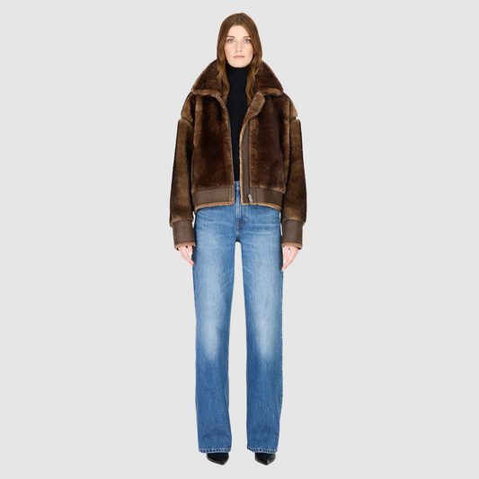 Reversible oversized cropped jacket curly wool and nappa combination Drop shoulder Tapered at hem Standard front zip closure Side and interior zip pockets