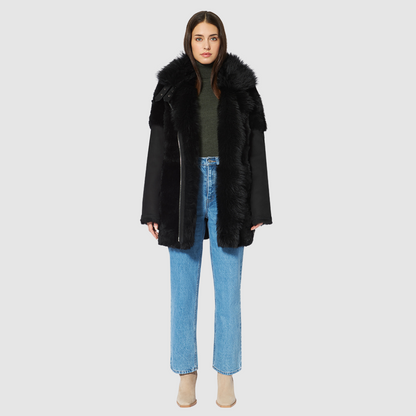 The HEART Shearling Jacket is a modern interpretation of classic shearling with a refined jet finish. Designed with timeless versatility, it balances luxury texture with everyday functionality. Its clean silhouette and plush construction make it an effortless statement piece for both heritage styling and après-ski wear.