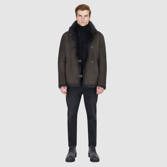 The Jedi Cappuccino Reversible Jacket is a modern statement piece, designed with the duality of rugged suede and luxurious Toscana shearling. Reversible for versatile styling, it transitions seamlessly between a sleek suede exterior and a plush Toscana teddy finish. A relaxed shoulder and spread collar offer a timeless silhouette, while slash side pockets and a front button closure balance practicality with understated refinement. A bold yet versatile layer, Jedi is built for elevated cold-weather dressing.