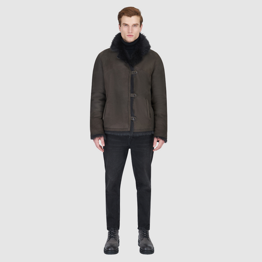The Jedi Cappuccino Reversible Jacket is a modern statement piece, designed with the duality of rugged suede and luxurious Toscana shearling. Reversible for versatile styling, it transitions seamlessly between a sleek suede exterior and a plush Toscana teddy finish. A relaxed shoulder and spread collar offer a timeless silhouette, while slash side pockets and a front button closure balance practicality with understated refinement. A bold yet versatile layer, Jedi is built for elevated cold-weather dressing.