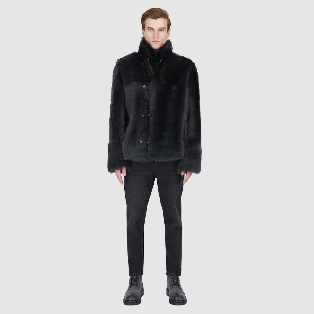 The Jedi Cappuccino Reversible Jacket is a modern statement piece, designed with the duality of rugged suede and luxurious Toscana shearling. Reversible for versatile styling, it transitions seamlessly between a sleek suede exterior and a plush Toscana teddy finish. A relaxed shoulder and spread collar offer a timeless silhouette, while slash side pockets and a front button closure balance practicality with understated refinement. A bold yet versatile layer, Jedi is built for elevated cold-weather dressing.