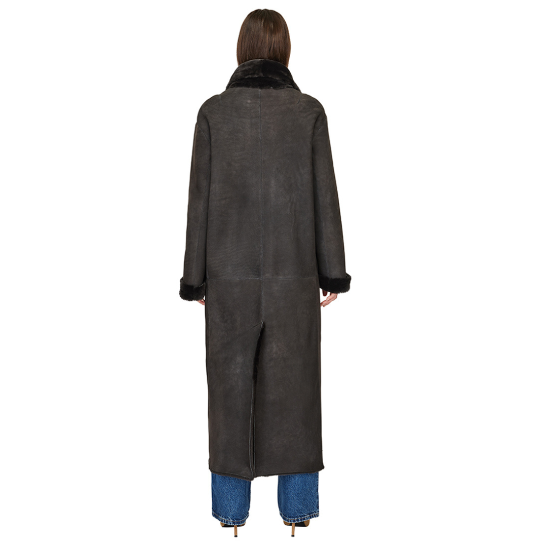 Reversible suede loose fitting duster Reverses to iron wool teddy Slight drop shoulder Back vent  Double breasted button closure Single welt side pockets on suede side  Slash side pockets on reversed iron wool side 