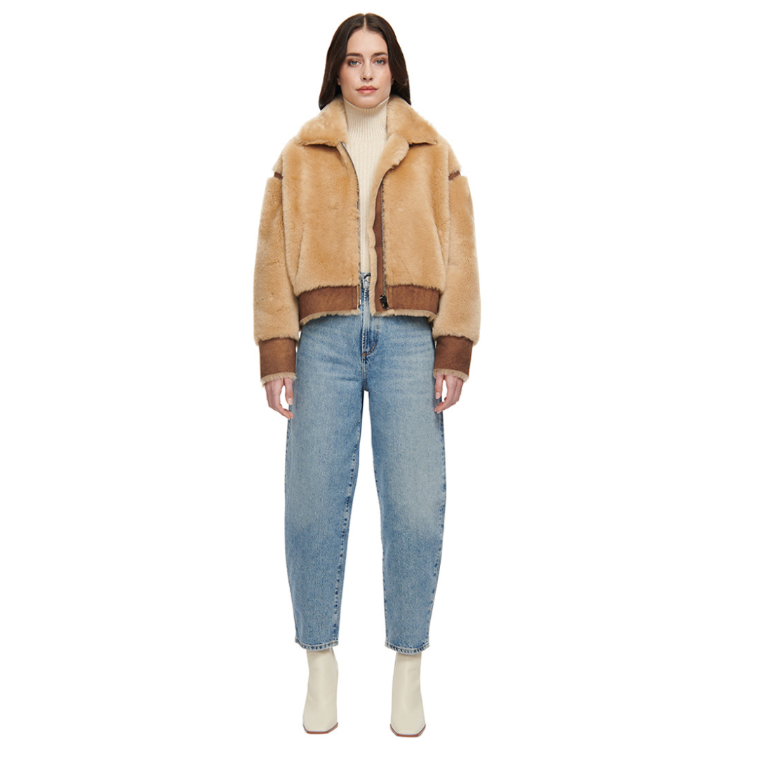 Reversible oversize cropped jacket Ironed wool and nappa combination Drop shoulder Tapered at hem Standard front zip closure Side and interior zip pockets