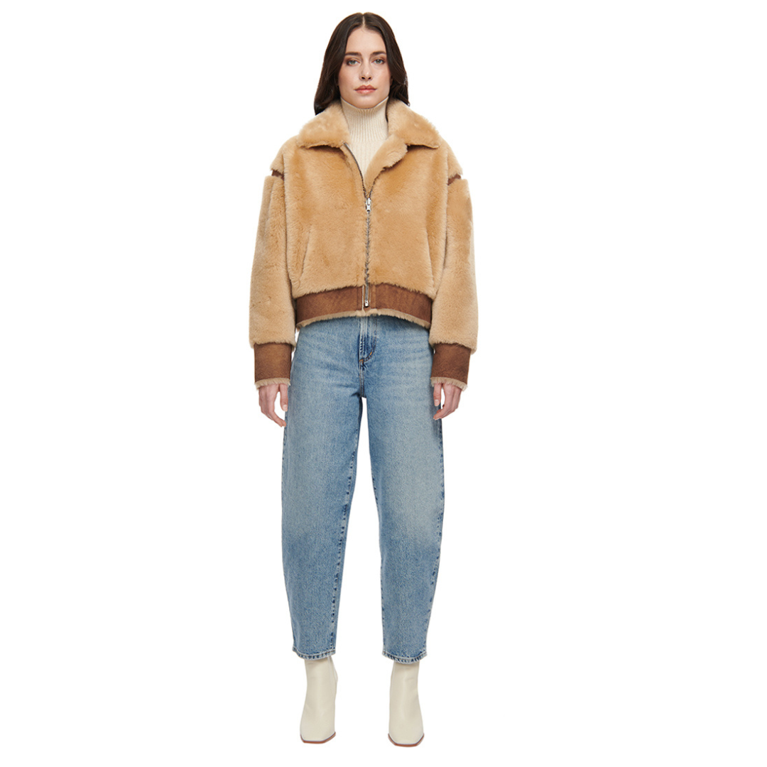 Reversible oversize cropped jacket Ironed wool and nappa combination Drop shoulder Tapered at hem Standard front zip closure Side and interior zip pockets