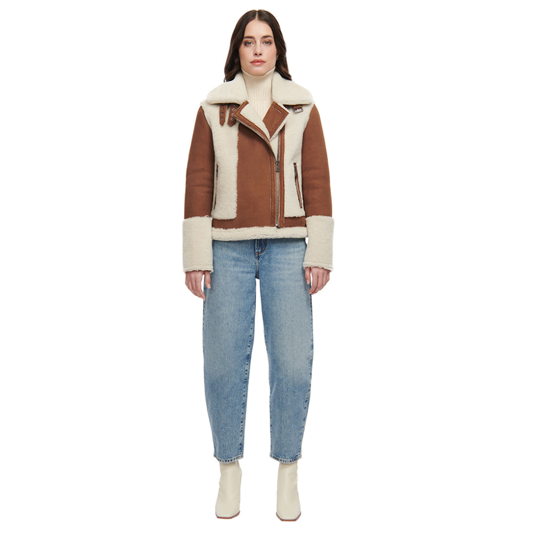 Nappa curly wool shearling moto Drop shoulder  Wool out cuff detail & sheared wool body and sleeves  Curly wool collar with double buckle detail  Asymmetrical front zip closure  Side and interior zip pockets
