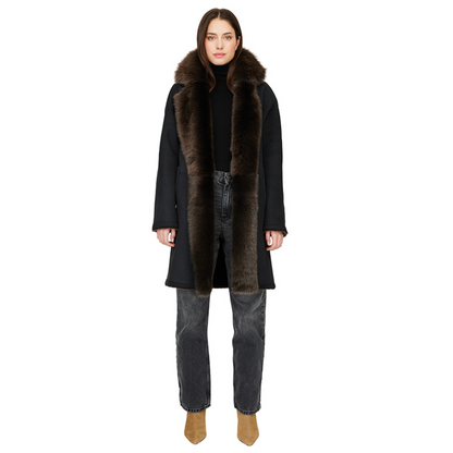 Reversible suede loose fitting coat Reverses to iron wool teddy Slight drop shoulder Double breasted button closure
