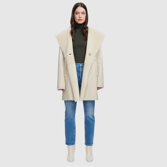 Reversible nappa oversized coat Reverses to ironed wool  Oversized hood, converts to shawl collar Raw edge finish Drop shoulder Pull through pockets