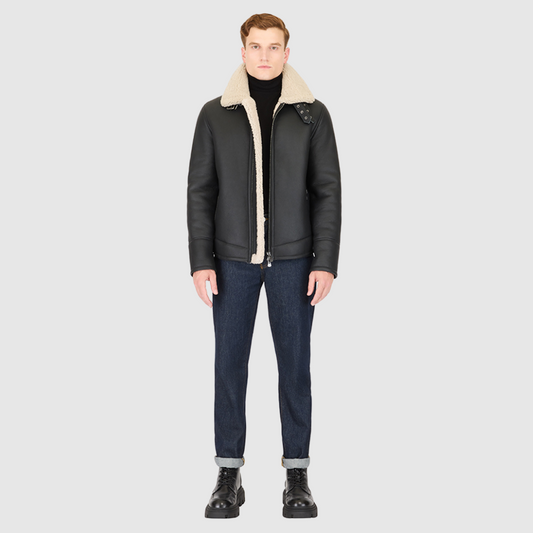 Shearling nappa moto with buckle detail on curly wool collar Fits true to size Standard zip closure Spread collar with buckle Interior zip pocket