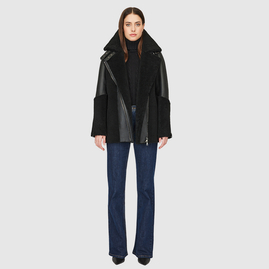 Curly wool and nappa mixed media coat Drop shoulder Oversized loose fitted style Curly wool detail on body and sleeve cuff Deep armhole and wide sleeves Straight fit Asymmetrical front zip closure Exterior zip pockets Hidden inside pockets