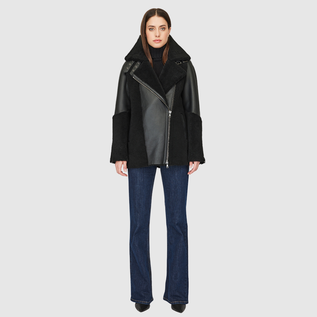 Curly wool and nappa mixed media coat Drop shoulder Oversized loose fitted style Curly wool detail on body and sleeve cuff Deep armhole and wide sleeves Straight fit Asymmetrical front zip closure Exterior zip pockets Hidden inside pockets