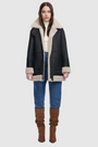Nappa curly wool shearling Reversible relaxed medium length nappa moto Reverses to curly wool teddy  Drop shoulder Curly wool collar and trims Straight fit  Patch pockets on both skin-out and reversed wool-out sides Front zip closure 