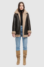 Nappa curly wool shearling Reversible relaxed medium length nappa moto Reverses to curly wool teddy  Drop shoulder Curly wool collar and trims Straight fit  Patch pockets on both skin-out and reversed wool-out sides Front zip closure 
