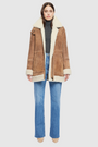 Vintage suede curly wool shearling Reversible relaxed medium length nappa moto Reverses to curly wool teddy  Drop shoulder Curly wool collar and trims Straight fit  Patch pockets on both skin-out and reversed wool-out sides Front zip closure