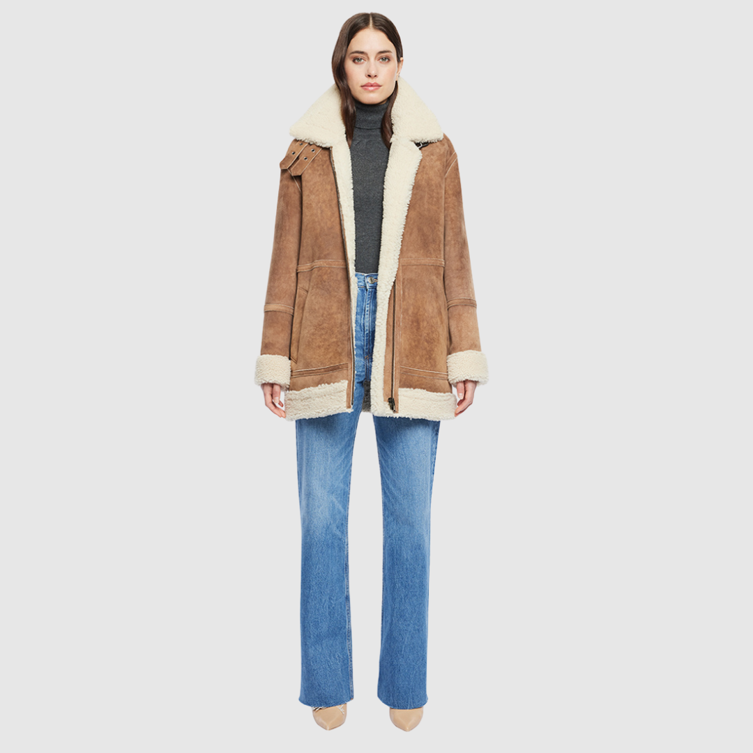 Vintage suede curly wool shearling Reversible relaxed medium length nappa moto Reverses to curly wool teddy  Drop shoulder Curly wool collar and trims Straight fit  Patch pockets on both skin-out and reversed wool-out sides Front zip closure