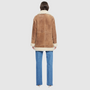Vintage suede curly wool shearling Reversible relaxed medium length nappa moto Reverses to curly wool teddy  Drop shoulder Curly wool collar and trims Straight fit  Patch pockets on both skin-out and reversed wool-out sides Front zip closure