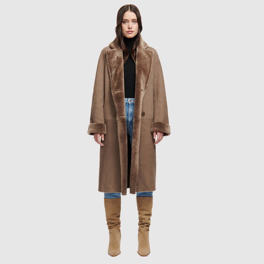 Reversible suede loose fitting coat Reverses to iron wool teddy Slight drop shoulder Double breasted button closure