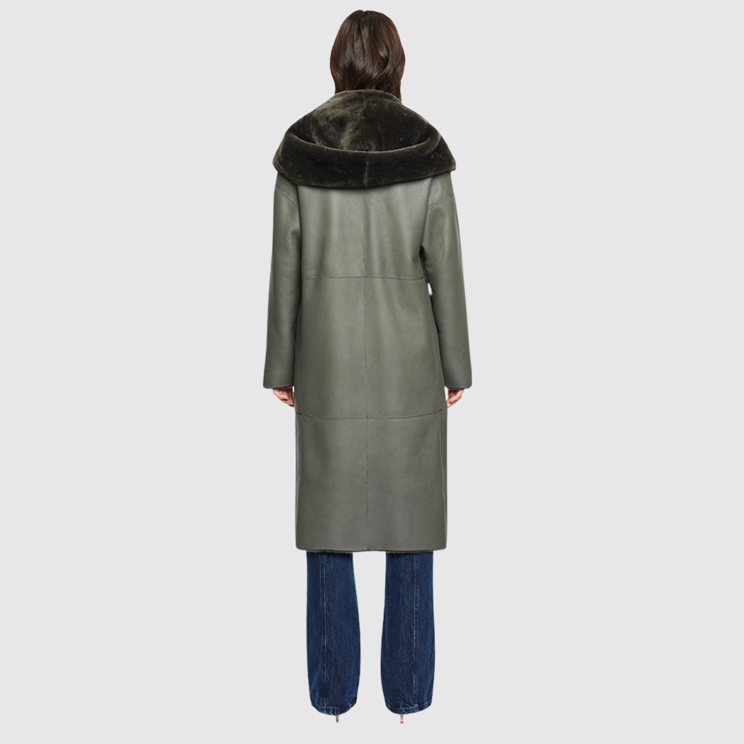 Reversible nappa oversized coat Reverses to ironed wool Oversized hood, converts to shawl collar Raw edge finish Drop shoulder Pull through pockets