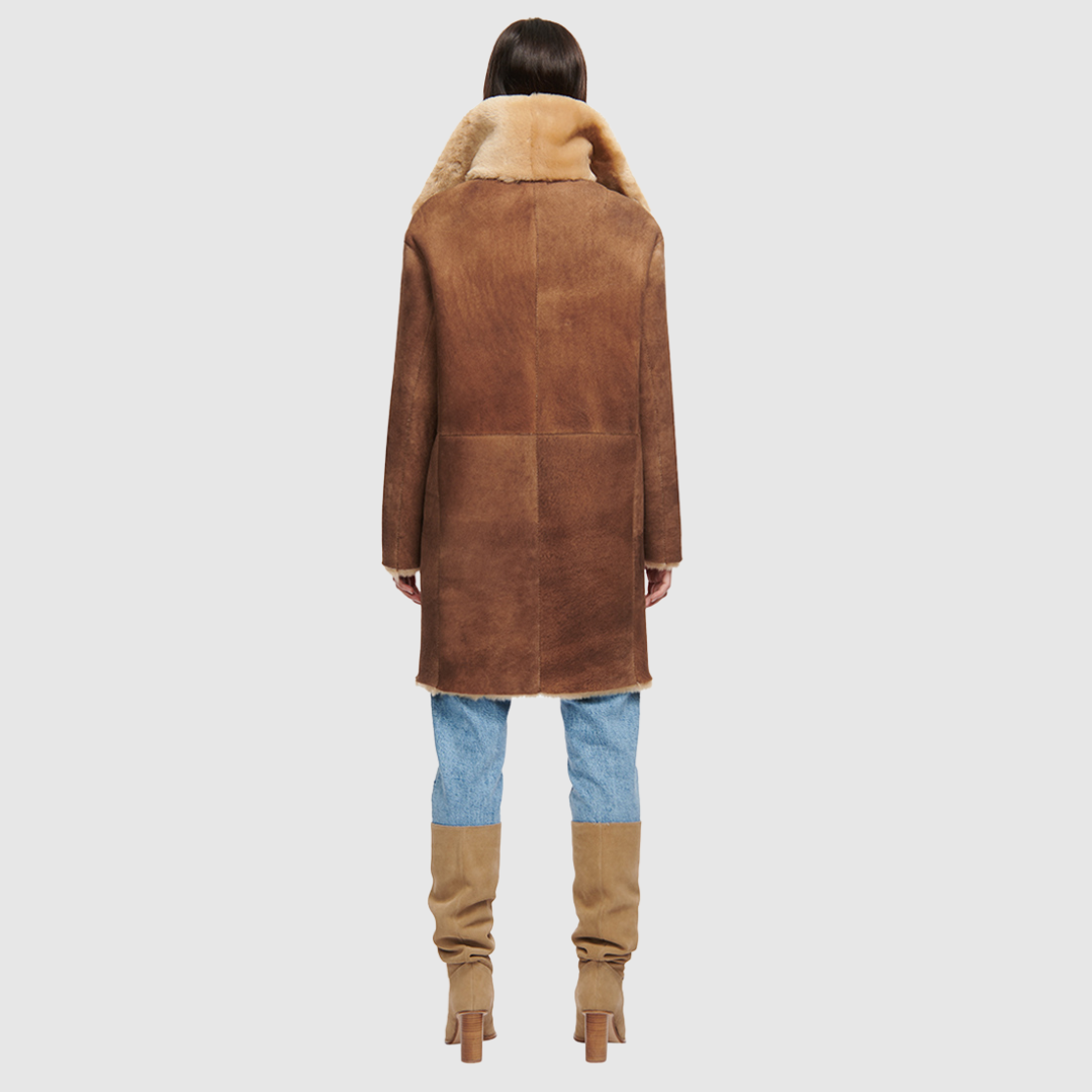 Reversible suede men's inspired coat Reverses to iron wool teddy Drop shoulder Relaxed fit through shoulders, arms and torso Oversized notch collar Buckle detail on collar Raw edge hem Single welt side pockets on suede side Slash side pockets on iron wool side 4 button closure